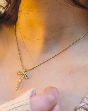 Long Bow Pendant Necklace