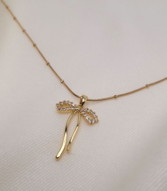 Long Bow Pendant Necklace