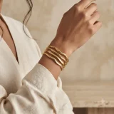 Wave gold cuff bracelet for women, Wave gold cuff bracelet India, Sculptural gold cuff bracelet, AMOHABOLD gold cuff bracelet, Anti tarnish gold bracelet, Minimal gold cuff for women, Gold plated wave bracelet, Modern cuff bracelet, Everyday gold jewellery bracelet, Luxury look cuff bracelet