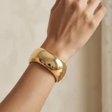 Stella mirror gold cuff bracelet for women, Shiny gold cuff bracelet, High polish gold bracelet, AMOHABOLD Stella cuff bracelet, Mirror finish gold cuff, Gold plated cuff bracelet for women, Minimal luxury gold bracelet, Anti tarnish cuff bracelet India, Bold gold cuff jewellery, Modern gold bracelet for women