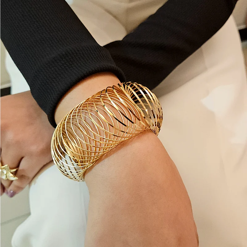 Elegant Gold Torus Coil Bracelet