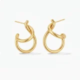 twisted statement hoop earrings, Twisted gold hoop earrings for women, Sculptural gold hoop earrings, AMOHABOLD statement hoops, Gold plated twisted hoops, Oversized gold hoop earrings India, Anti tarnish hoop earrings, Modern gold statement earrings, Lightweight gold hoops for women, Fashion hoop earrings